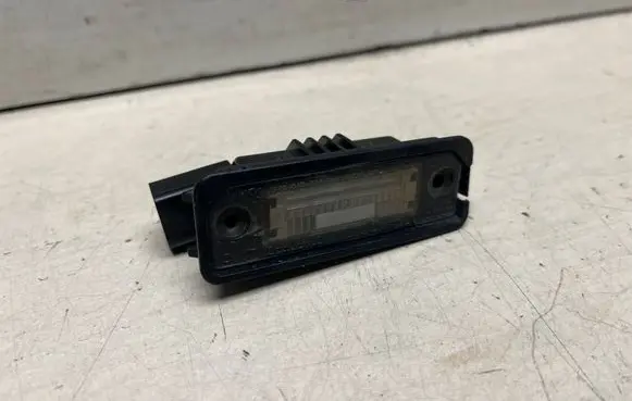 Volkswagen Golf V Number plate light 1J6943021B