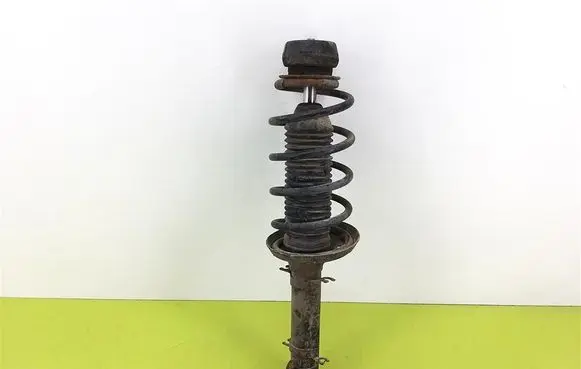 Skoda Octavia Mk1 (1U) Front shock absorber with coil spring 1J0413031S
