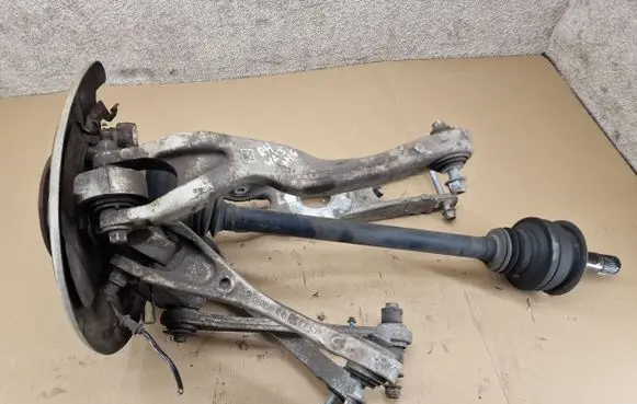 Rear wheel hub spindle/knuckle