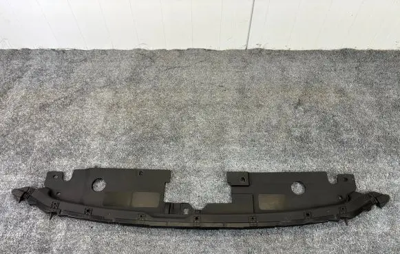 Engine bonnet/hood lock trim molding