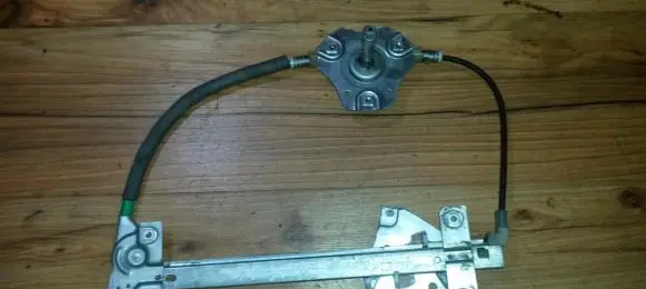 Sliding door window regulator with motor