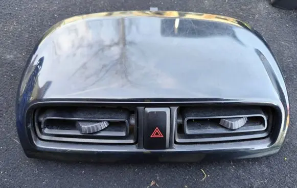 Dash center air vent grill