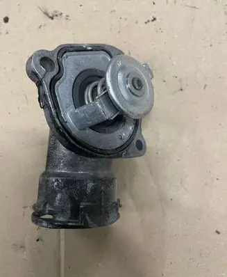 Thermostat/thermostat housing
