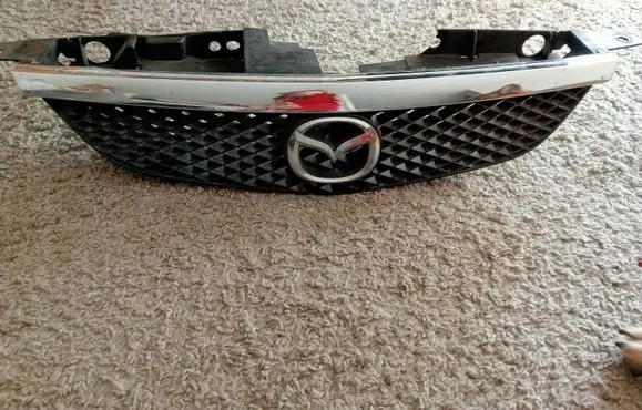 Mazda 323 F Front grill B30k5072x