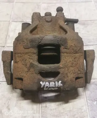 Toyota Yaris Front brake caliper 11810252012