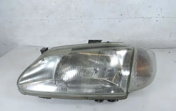 Renault Scenic I Headlight/headlamp 7701672734