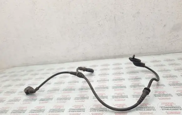 Volkswagen Touran I Front ABS sensor wiring 1J0906102