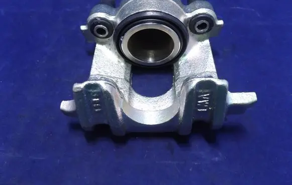Volkswagen Polo II 86C 2F Front brake caliper 50859 191615124 UBD