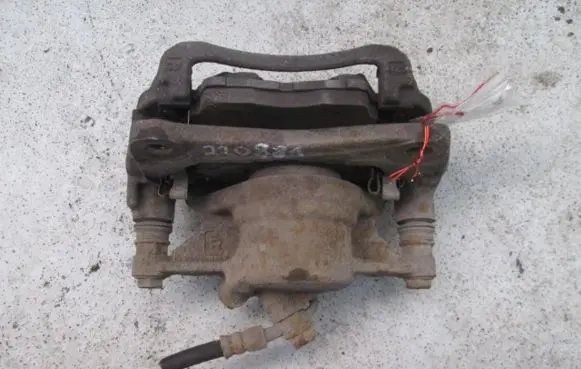 Toyota Corolla E100 Front brake caliper