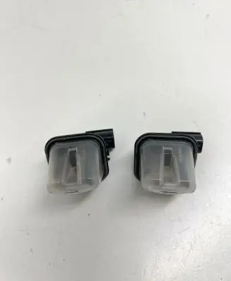 Suzuki Swift III Number plate light 34853