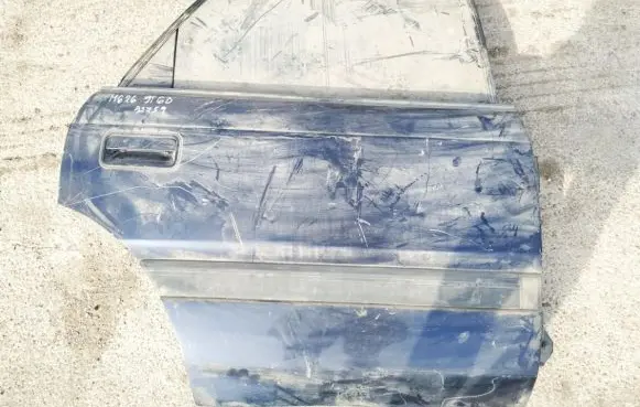 Mazda 626 Rear door melynos
