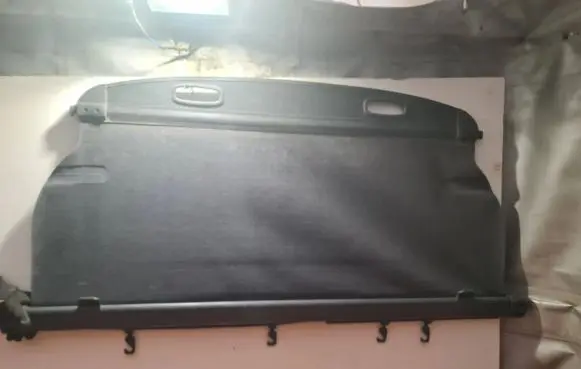 KIA Carens II Parcel shelf load cover 