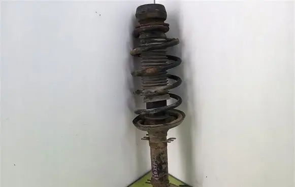 Skoda Octavia Mk1 (1U) Front shock absorber with coil spring 1J0413031N
