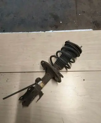 Toyota Avensis T270 Front shock absorber with coil spring F34L6