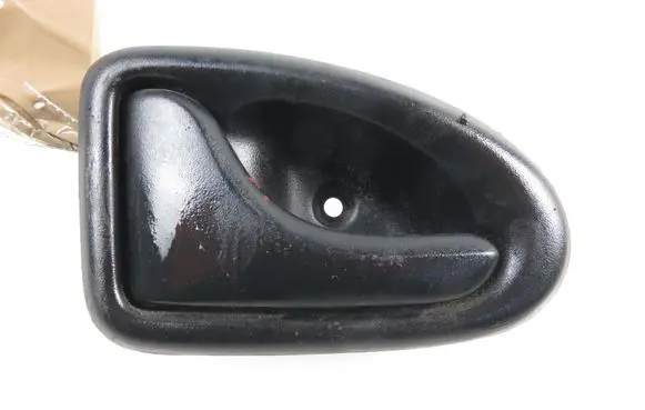 Dacia Logan I Rear door interior handle trim 7700830078