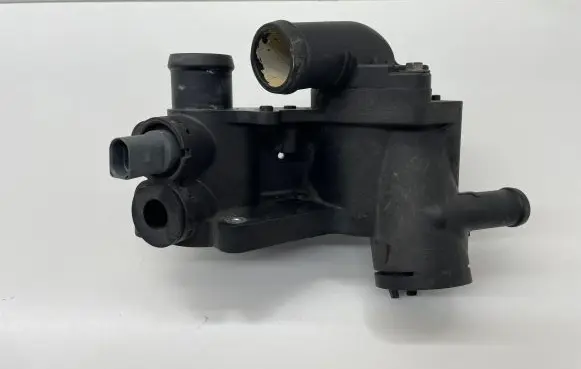 Thermostat/thermostat housing