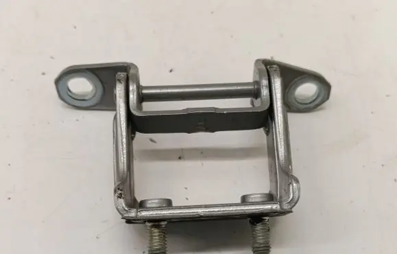 Rear door upper hinge