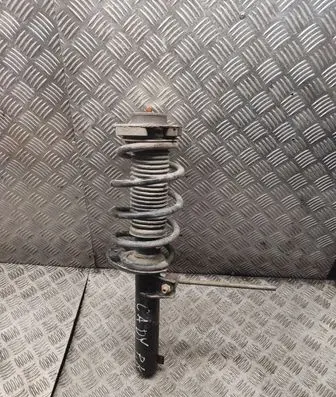 Volkswagen Caddy Front shock absorber with coil spring