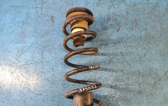 Dodge Grand Caravan Rear coil spring 4670589AA