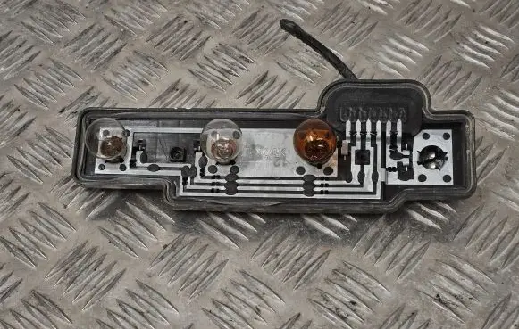 Volkswagen Caddy Tail light bulb cover holder 2K0945257A
