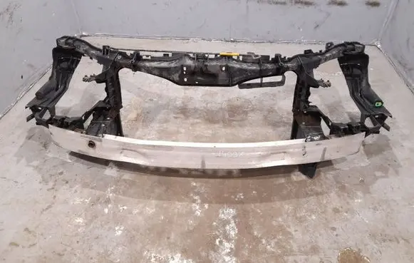 Radiator support slam panel