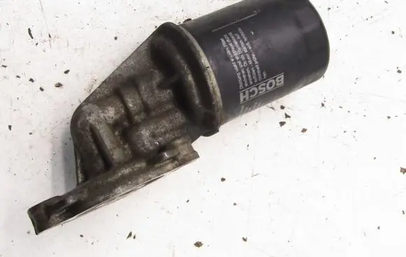 Suzuki Vitara (LY) Oil filter mounting bracket 105410
