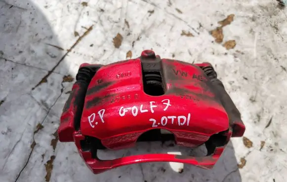 Volkswagen Golf VII Front brake caliper
