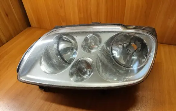 Volkswagen Touran I Headlight/headlamp 1T0941005M 0301205203