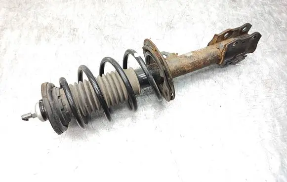 Toyota Yaris Front shock absorber with coil spring