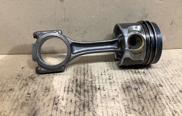 Piston with connecting rod