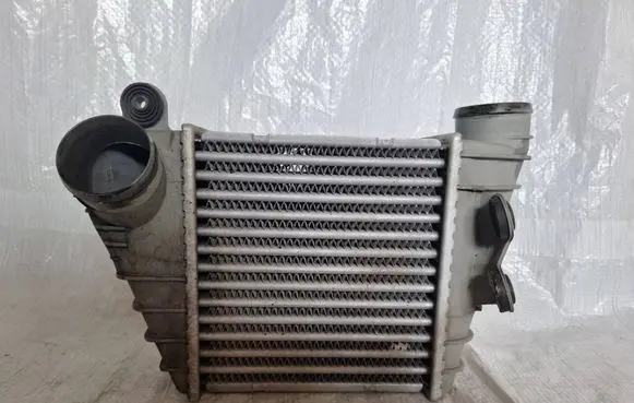 Volkswagen Golf IV Intercooler radiator 1J0145805
