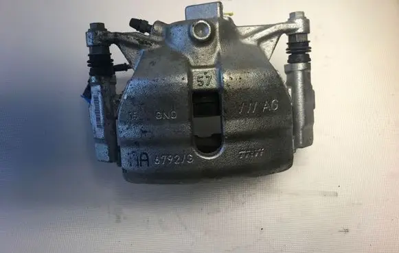 Volkswagen Golf VII Front brake caliper 5Q0106DH