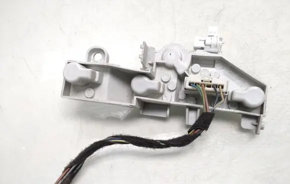 Tail light bulb cover holder