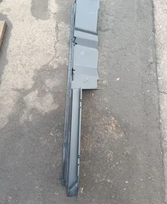 Trunk/boot lower side trim panel