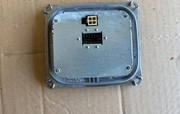 Opel Astra J Headlight ballast module Xenon 130732935000 10EEG110776