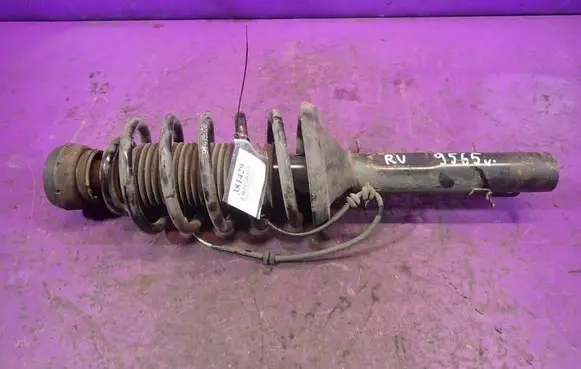 Skoda Octavia Mk2 (1Z) Front shock absorber with coil spring 