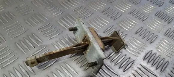 Mazda 626 Rear door check strap stopper