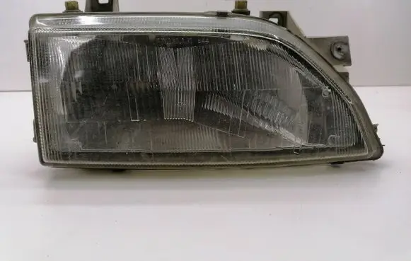 Ford Escort Headlight/headlamp 7R0145489