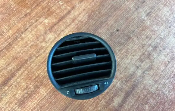 Volkswagen Caddy Dash center air vent grill 2K0819703B