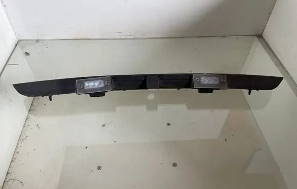 Audi A3 S3 8L Trunk door license plate light bar 8D9827576 ALS110M9