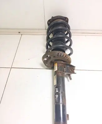 Skoda Yeti (5L) Front shock absorber with coil spring 1K0412021KQ 1K0413031BL
