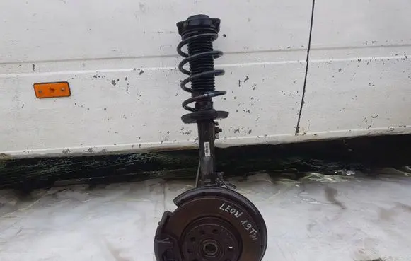 Seat Leon (1P) Front shock absorber with coil spring 1K0413031CG