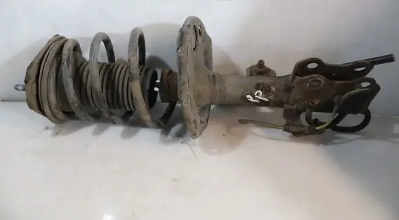 Front shock absorber with coil spring