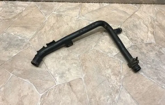 Volkswagen PASSAT B7 Engine coolant pipe/hose 03L121065AJ