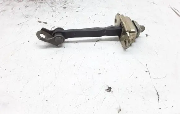 Nissan Primera Front door check strap stopper