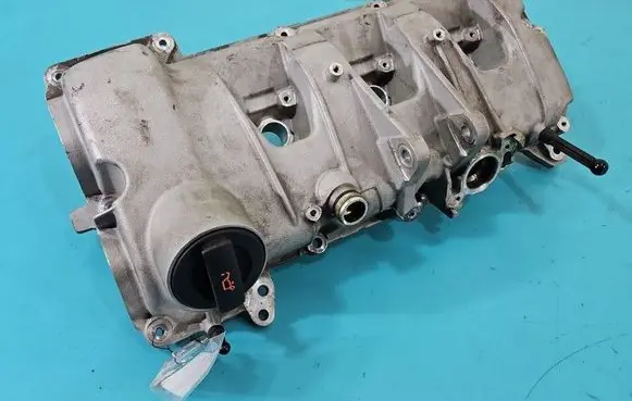 Rocker cam cover
