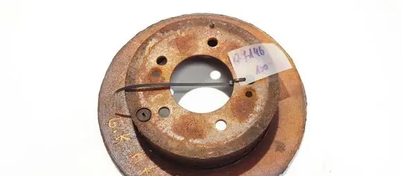 KIA Carens II Rear brake disc neventiliuojamas