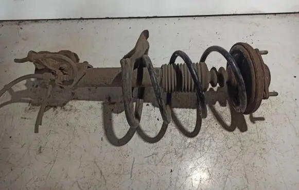 Front shock absorber with coil spring