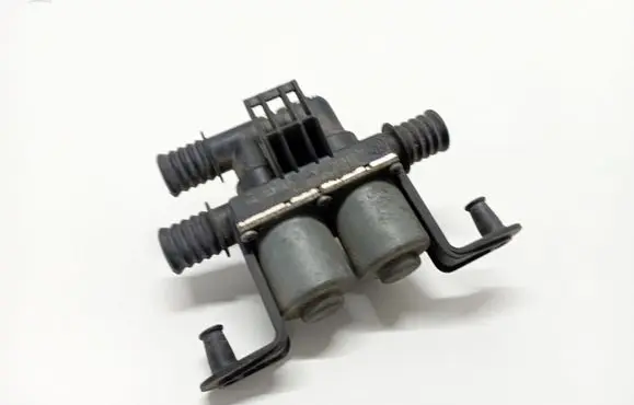 Coolant heater control valve