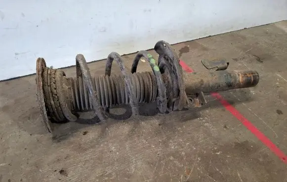 Volvo V60 Front shock absorber with coil spring 31406002